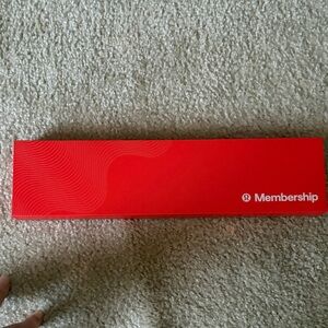Lululemon Red Membership keychain and box